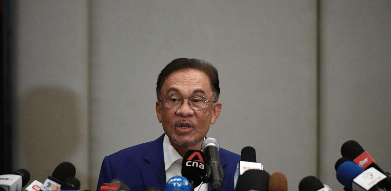 Opposition leader Anwar Ibrahim in Kuala Lumpur following a meeting with the Malaysian king to prove he has support to take power and fulfil a decades-old ambition of becoming premier. Credit: AFP Photo