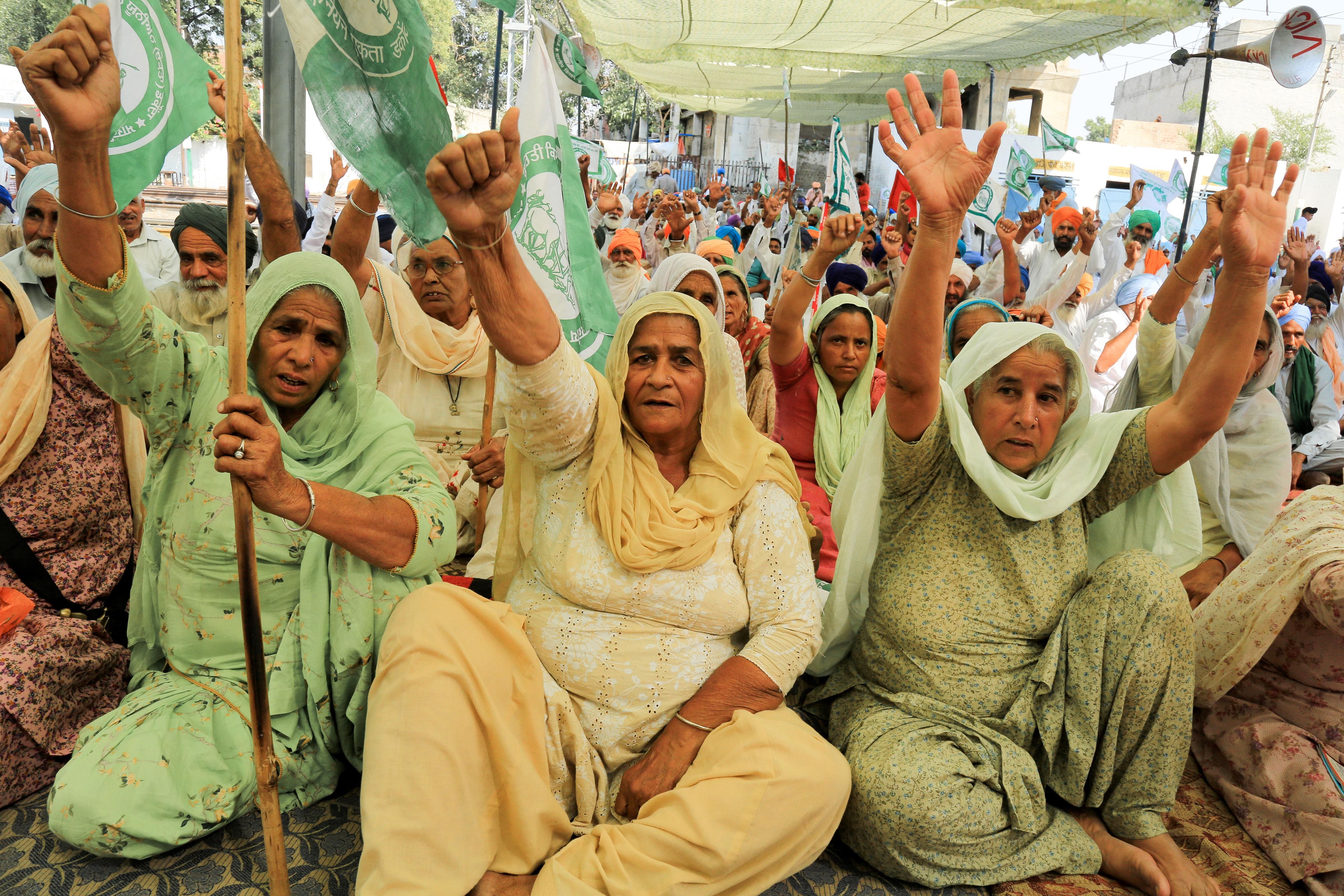 Women raise slogans during their protest against the farm laws in Bathinda, Friday, Oct. 16, 2020. Credit: PTI Photo