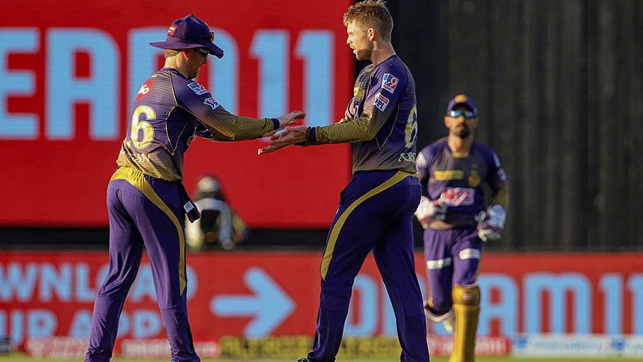 Kolkata Knight Riders (KKR) players Lockie Ferguson and Eoin Morgan celebrate the wicket of Sunrisers Hyderabad (SRH) batsman Manish Pandey. Credits: PTI Photo