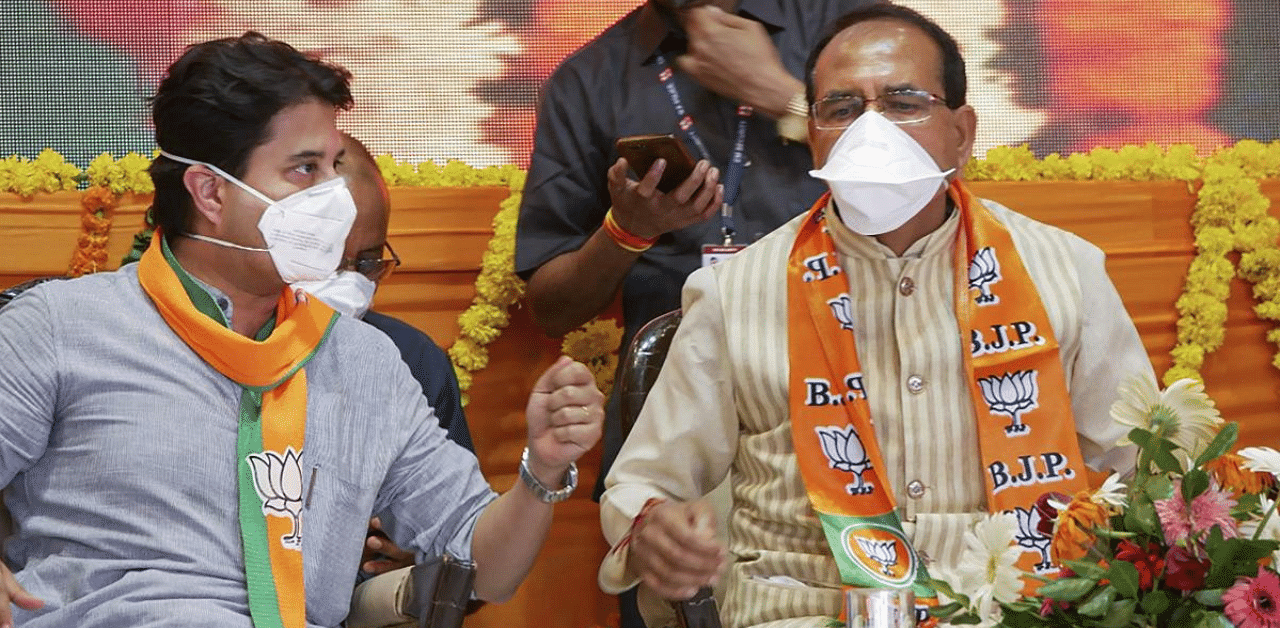 Madhya Pradesh Chief Minister Shivraj Singh Chouhan and BJP MP Jyotiraditya Scindia. Credit: PTI Photo