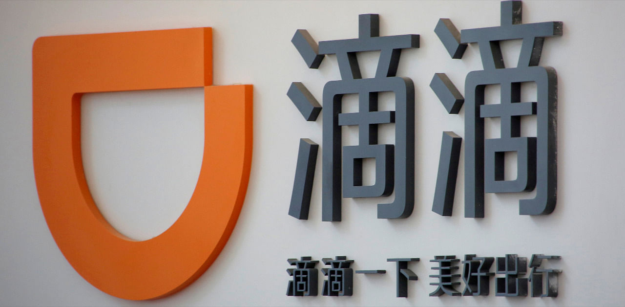 The logo of Didi Chuxing is seen at its headquarters in Beijing, China. Credit: Reuters Photo