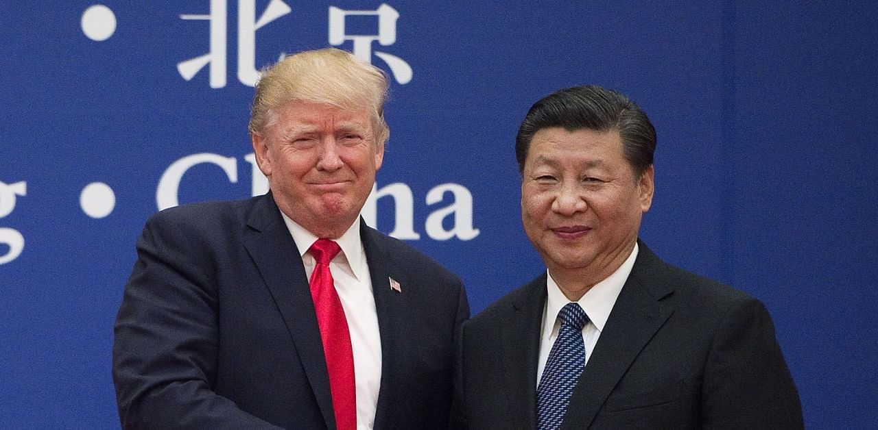 President Donald Trump and China's President Xi Jinping. Credit: AFP Photo