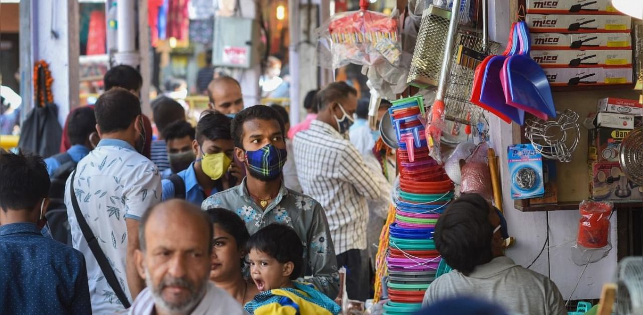 Crowded Chandni Chowk market during festive season, amid the ongoing coronavirus pandemic, in New Delhi, Monday, Oct. 19, 2020. Credit: PTI Photo