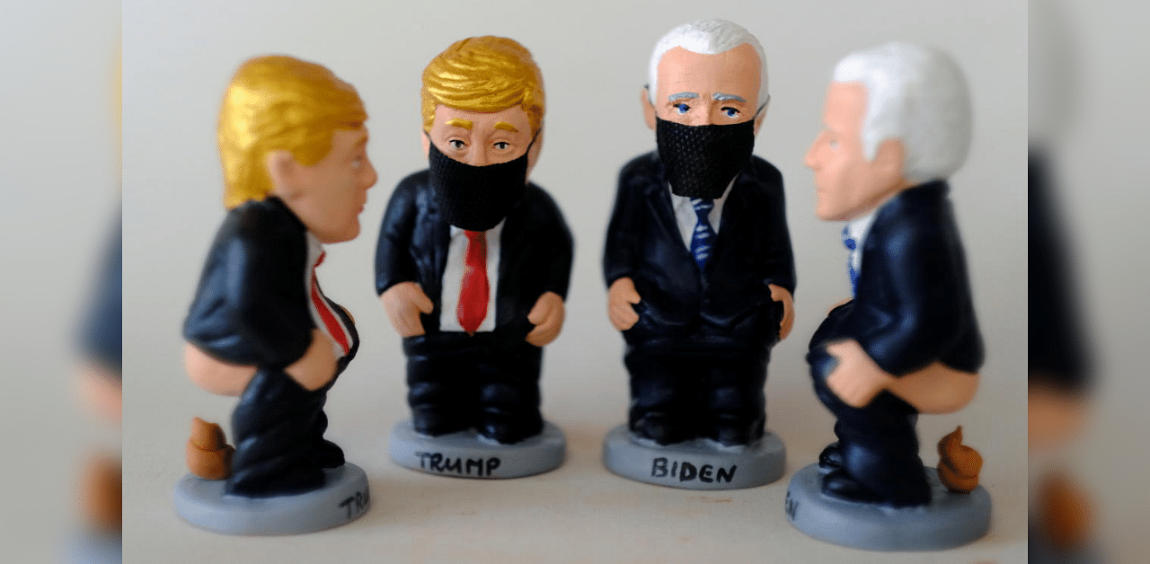 Clay "caganers" representing U.S. President Donald Trump and Democratic presidential candidate Joe Biden are pictured in a pottery in Torroella de Montgri, near Girona, Spain, October 20, 2020. Credit: Reuters Photo
