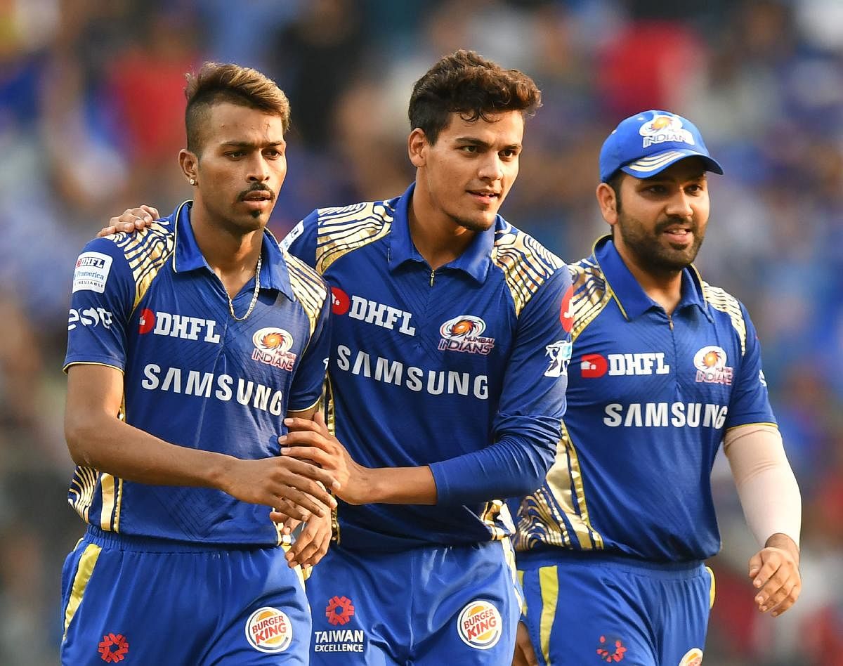 Rahul Chahar (centre) says the stint with Mumbai Indians in this year's IPL boosted his confidence. AFP