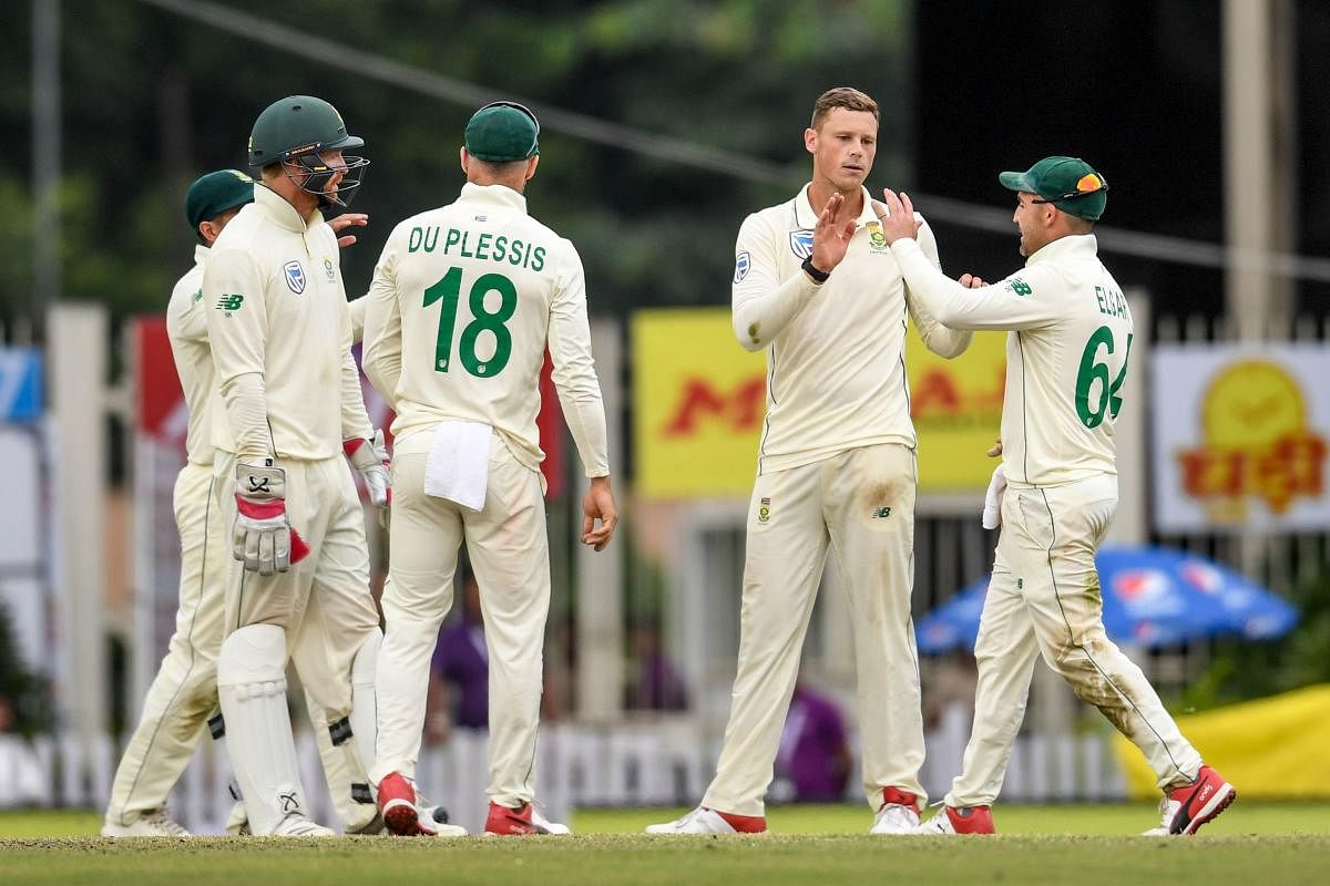 South Africa's George Linde (second from right) celebrates with team-mates after dismissing India's Ravindra Jadeja on the second day of the third Test in Ranchi on Sunday. AFP