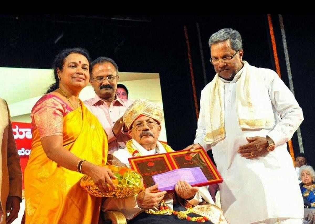 Pandanda Kuttappa was conferred with the Karnataka Rajyotsava Award in 2015