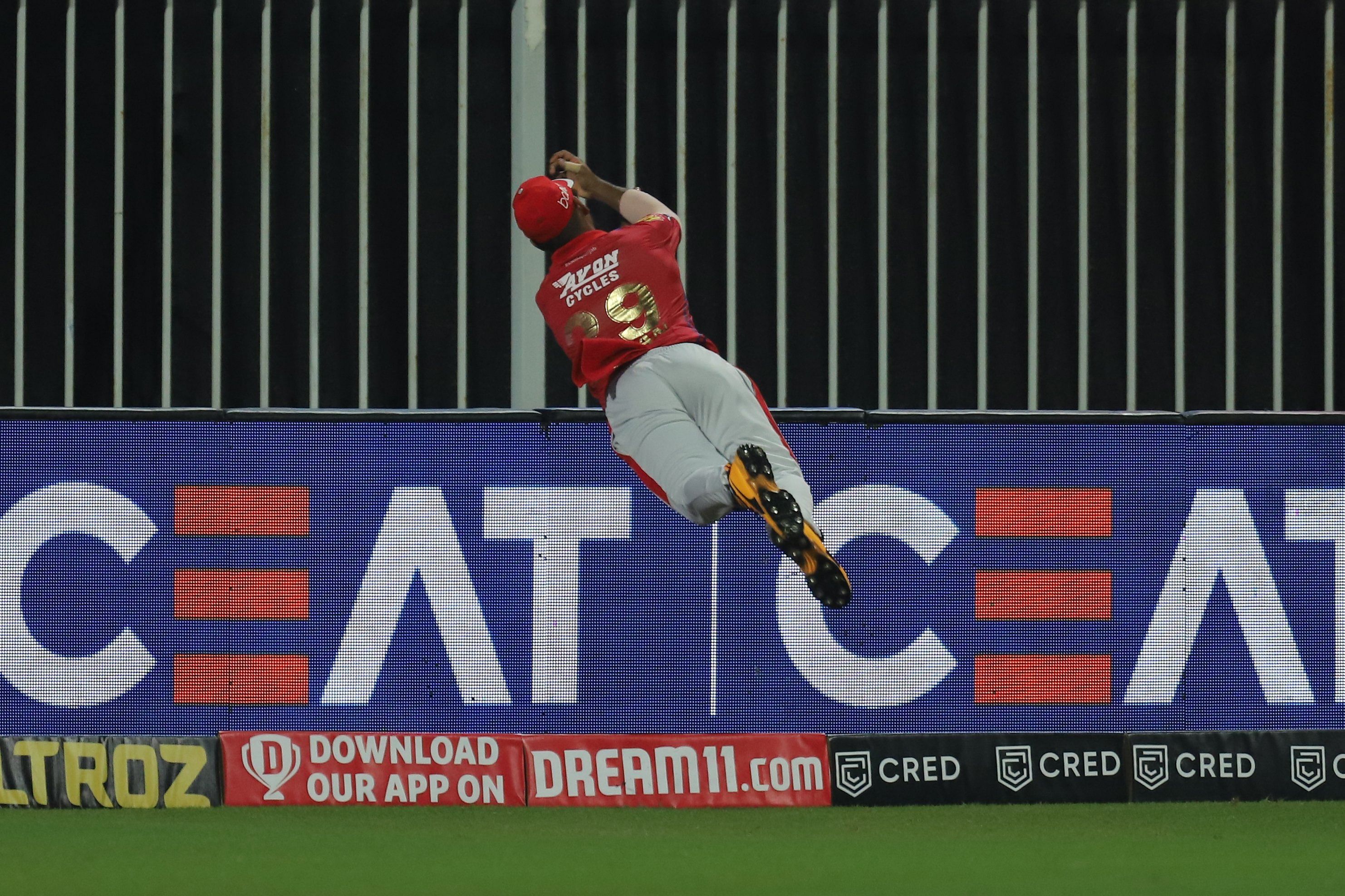 A snap of Nicholas Pooran’s acrobatic effort to save a six for KXIP. Credit: Twitter/@lionsdenkxip