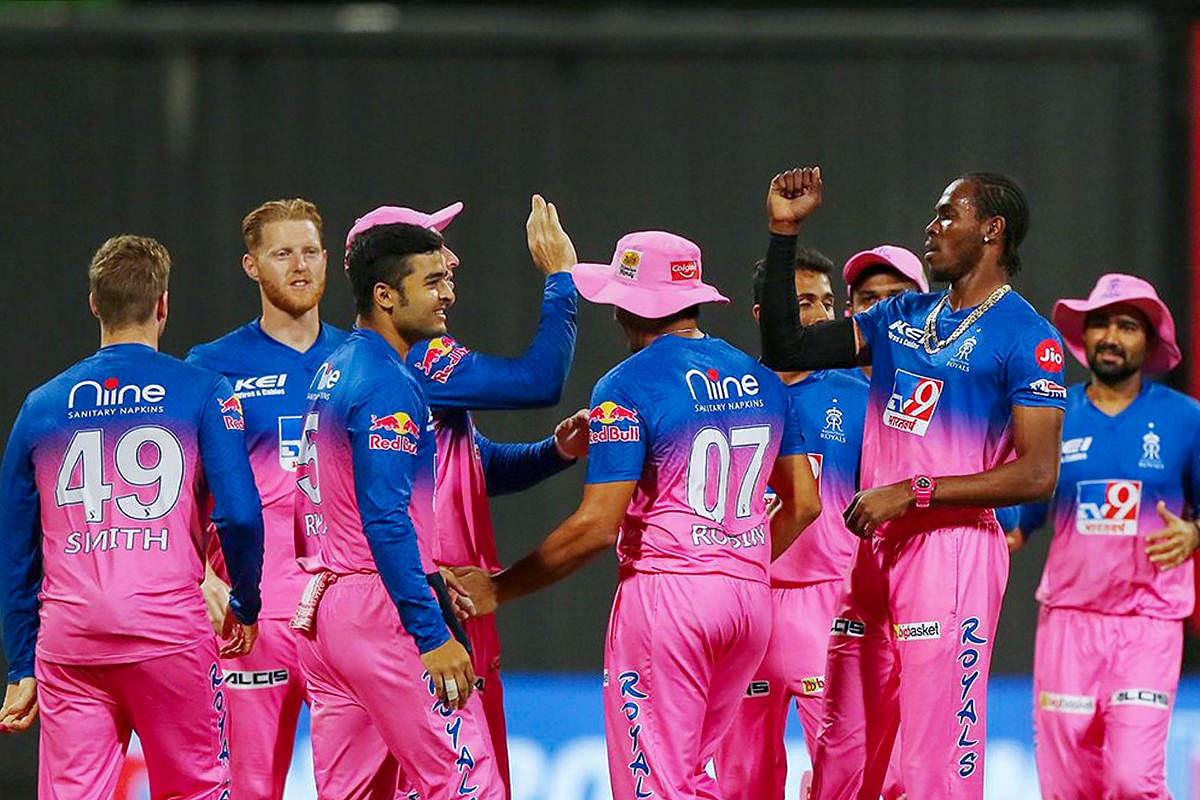RR players celebrate the wicket of batsman Faf du Plessis at Zayed Cricket Stadium in Abu Dhabi. Credit: PTI Photo