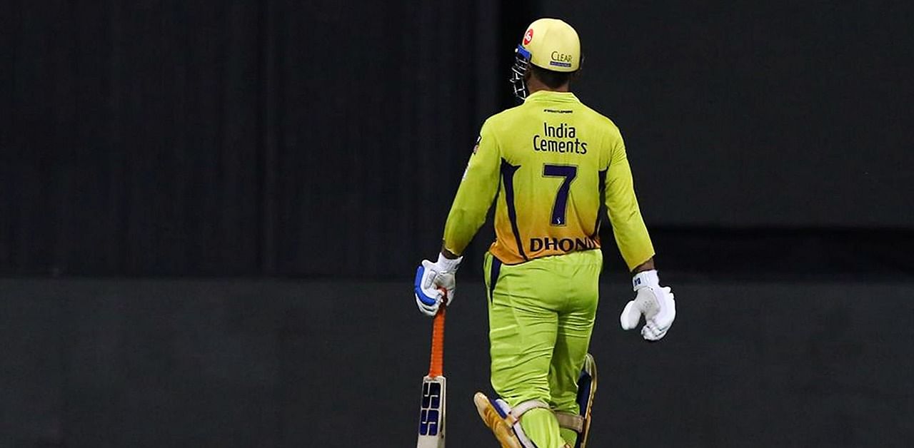 Chennai Super Kings captain MS Dhoni walks back to the pavilion after getting dismissed during the Indian Premier League 2020 cricket match against Rajasthan Royals. Credit: PTI Photo