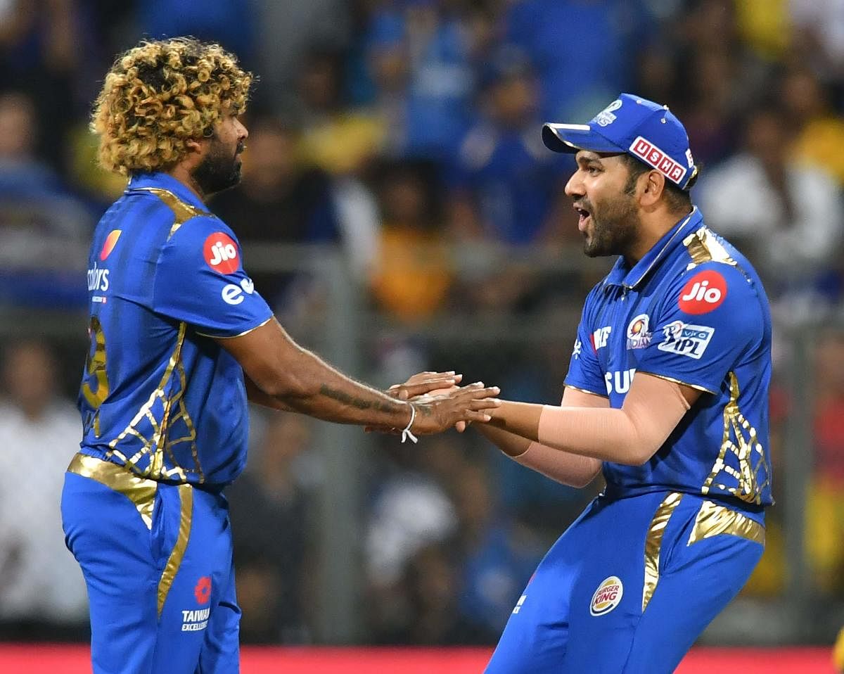 Mumbai Indians captain Rohit Sharma said whenever his team was in trouble, Lasith Malinga (left) has always bailed them out. AFP FILE PHOTO