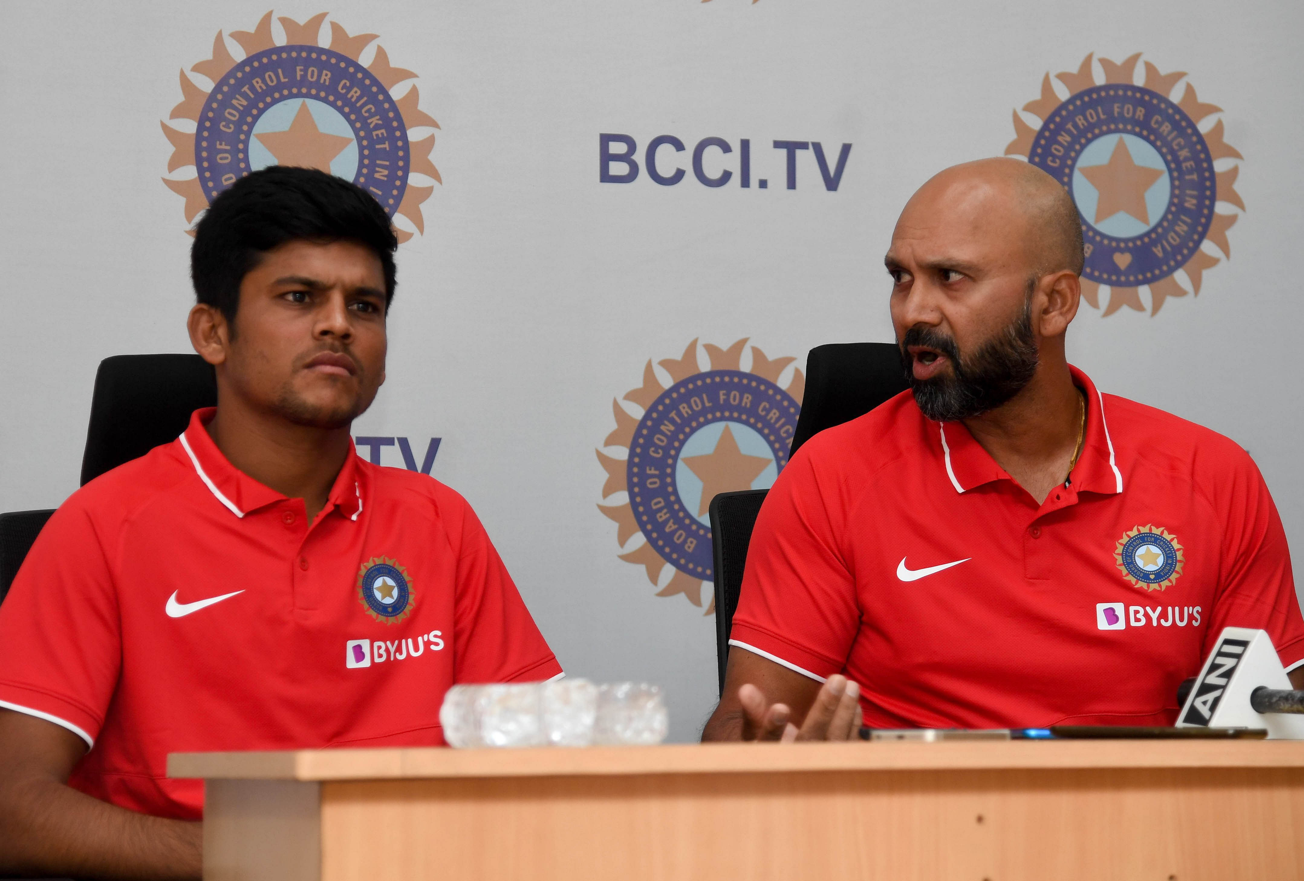 Batsman Priyam Garg (left) and under-19 head coach Paras Mhambrey.