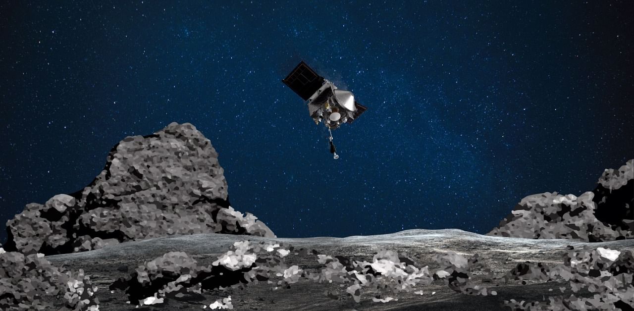 This NASA file image obtained August 11, 2020 shows an artist's rendering of the OSIRIS-REx spacecraft descending towards asteroid Bennu to collect a sample of the asteroid’s surface. Credit: AFP Photo