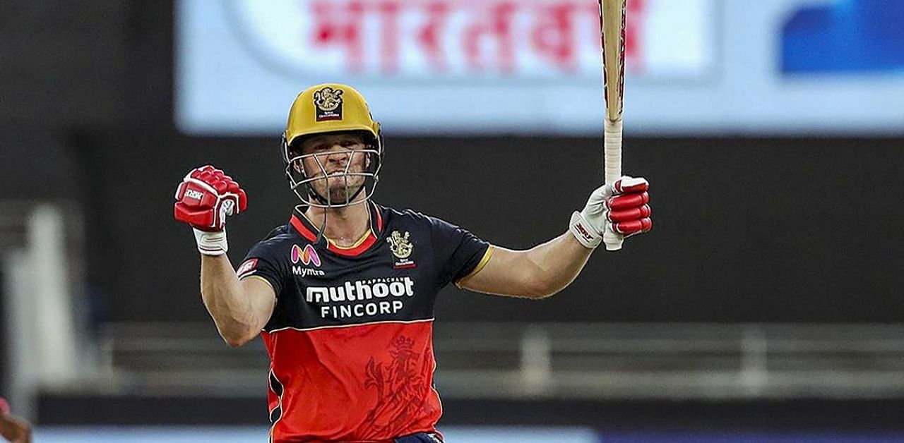 AB de Villiers of Royal Challengers Bangalore celebrates after defeating Rajasthan Royals by 7 wickets at the Dubai International Cricket Stadium on Oct. 17, 2020. Credit: PTI Photo/Sportzpics for BCCI
