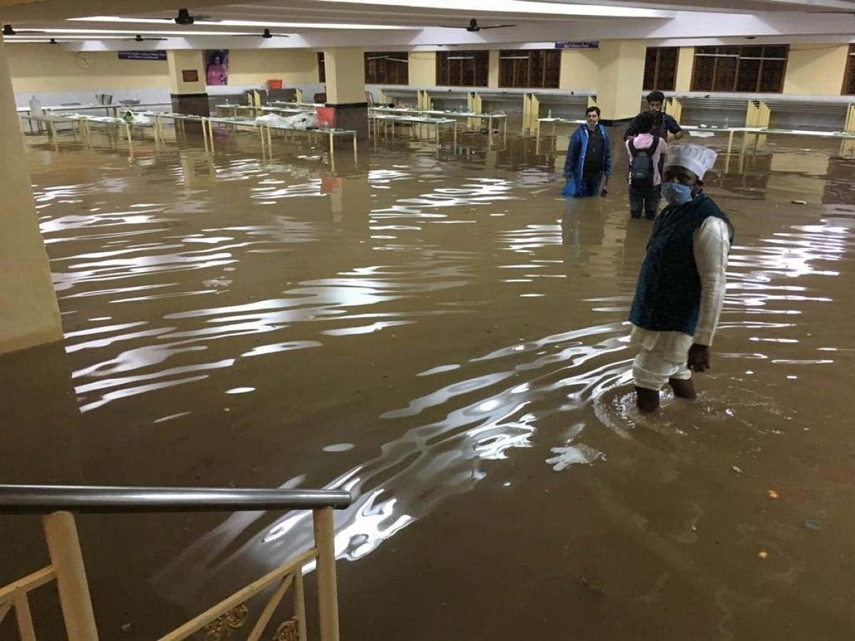 Rainwater gushed into the banqueting hall of Meenakshi Kalyana Mantapa, RR Nagar, Bengaluru, on Tuesday night. SPECIAL ARRANGEMENT