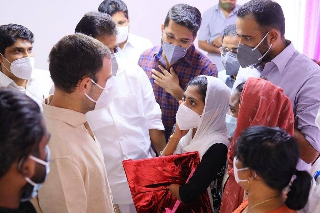 Kollam native Amina S, who has a deformed left hand by birth, cleared the NEET with 1916th rank. She met Congress leader Rahul Gandhi in Wayanad. Credit: Facebook/@rahulgandhi