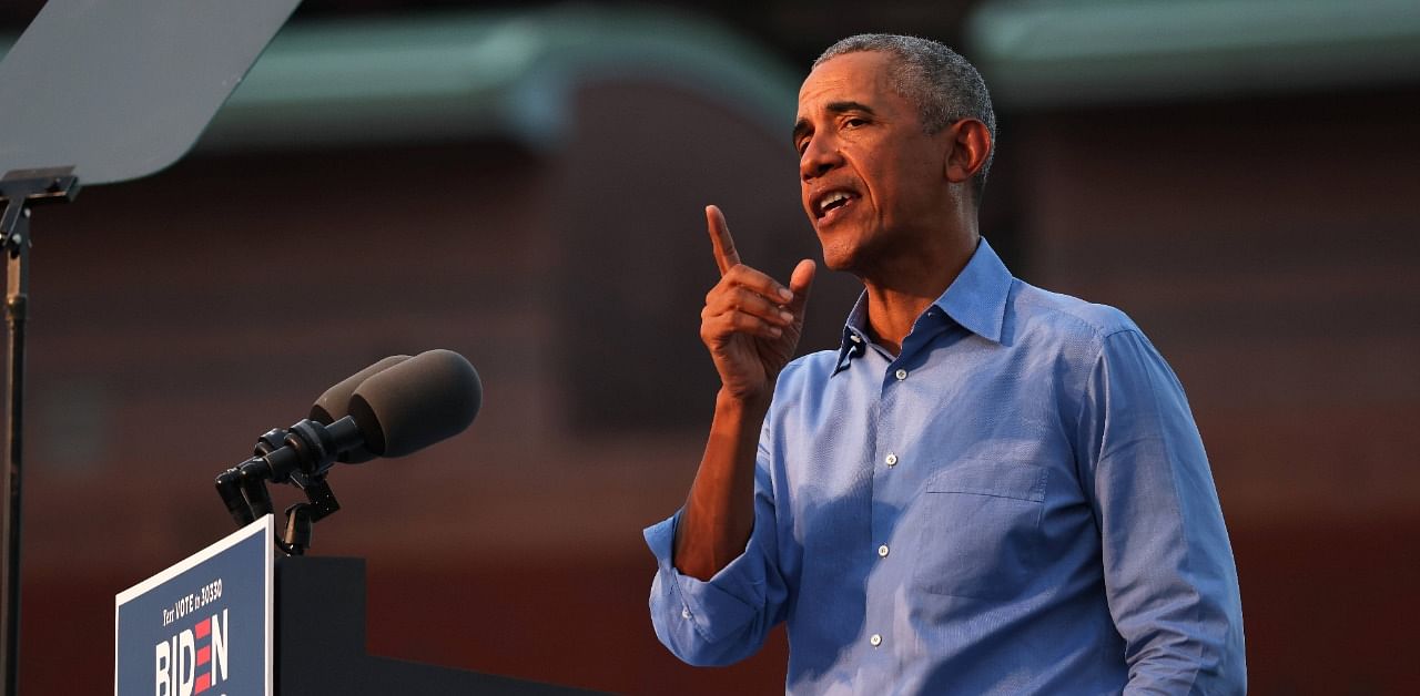 Former US President Barack Obama speaks at a drive-in rally for Democratic presidential nominee Joe Biden. Credit: AFP Photo
