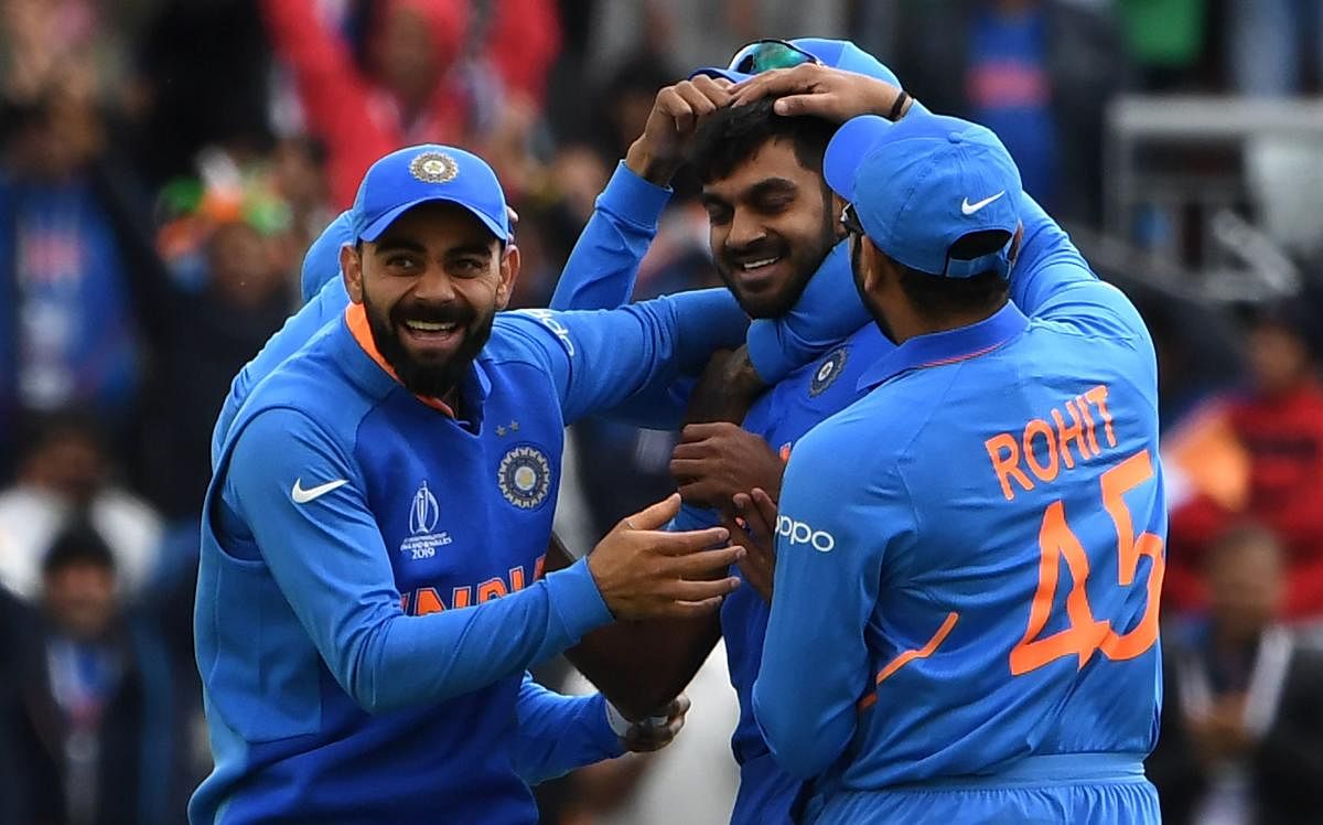 STRONGER TOGETHER Every player has played his role in ensuring a comfortable outing so far for the Indian team at the World Cup. AFP