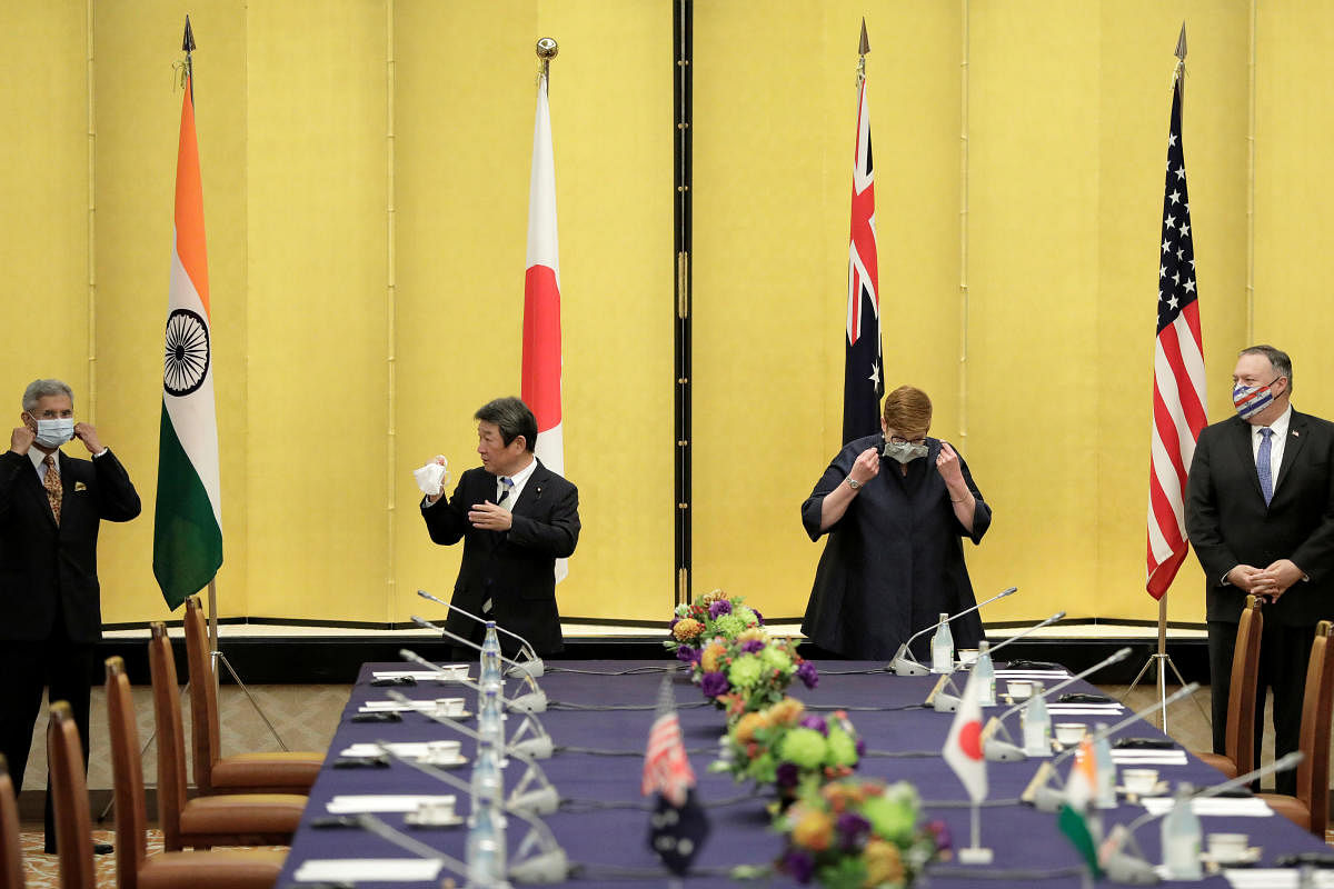 India's Foreign Minister Subrahmanyam Jaishankar, Japan's Foreign Minister Toshimitsu Motegi, Australian Foreign Minister Marise Payne and U.S. Secretary of State Mike Pompeo put on face masks as they attend a meeting in Tokyo, Japan October 6, 2020. Kiyo