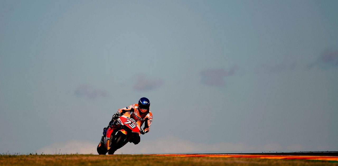 Repsol Honda Team's Spanish rider Alex Marquez takes a curve during the first free practice session of the MotoGP race of the Grand Prix of Teruel at the Motorland circuit in Alcaniz. Credit: AFP