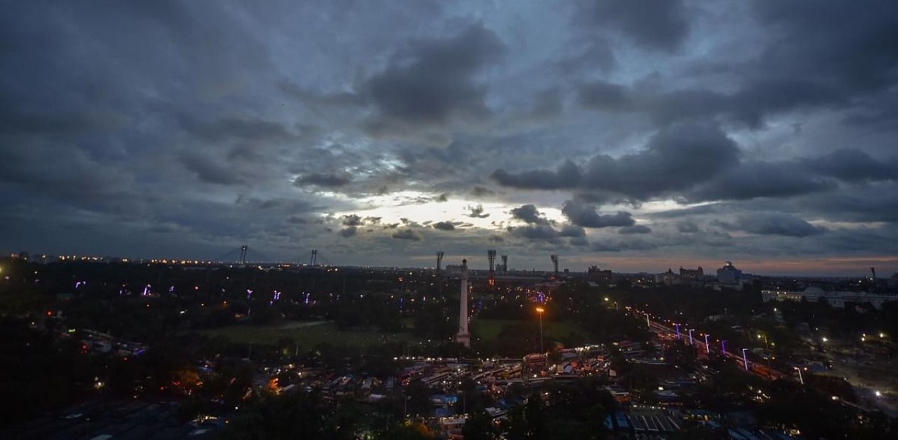 Dark clouds hover in the sky over Kolkata. Credit: PTI