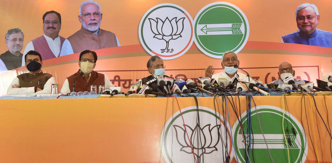 Janta Dal United National President and Bihar Chief Minister Nitish Kumar with BJP senior leader and Dy CM Sushil Kumar Modi addresses a press conference of National Democratic Alliance (NDA) ahead of Bihar Assembly election, in Patna, Tuesday, Oct. 6,2020. Credit: PTI Photo