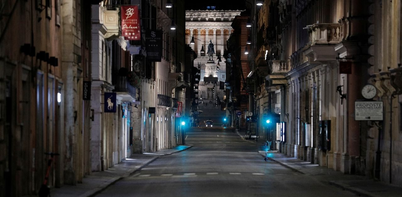 A deserted Via del Corso is pictured as a curfew imposed by the region of Lazio from midnight to 5 am to curb the coronavirus disease infections in Rome, Italy. Credit: Reuters Photo