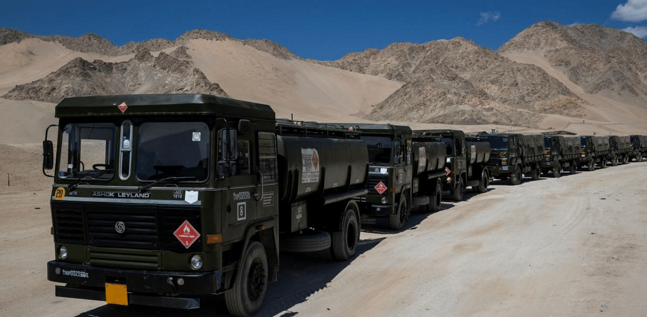 Military trucks carrying supplies move towards forward areas in the Ladakh region. Credit: Reuters Photo