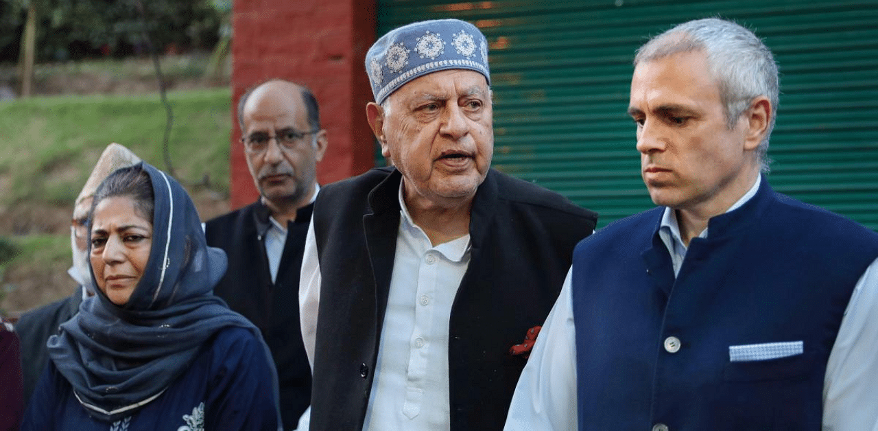 Jammu and Kashmir National Conference President Farooq Abdullah addresses a press conference along with his son Omar Abdullah, Peoples Democratic Party (PDP) President Mehbooba Mufti and others after meeting of signatories to the Gupkar declaration. Credit: PTI Photo