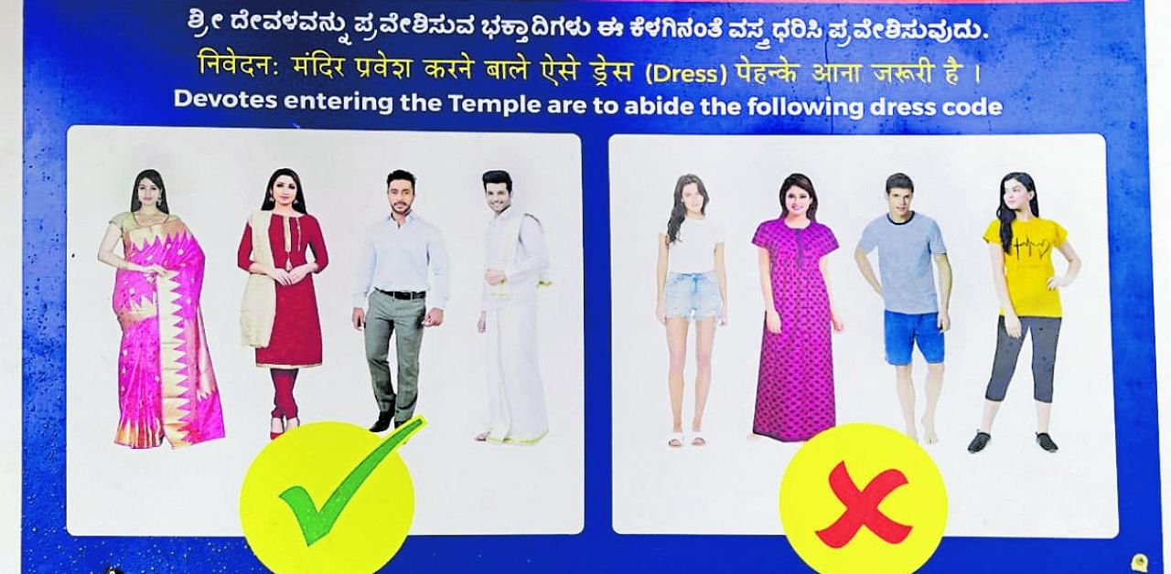 A board mounted at the Bhagavathi Temple at Sasihithlu on dress code.