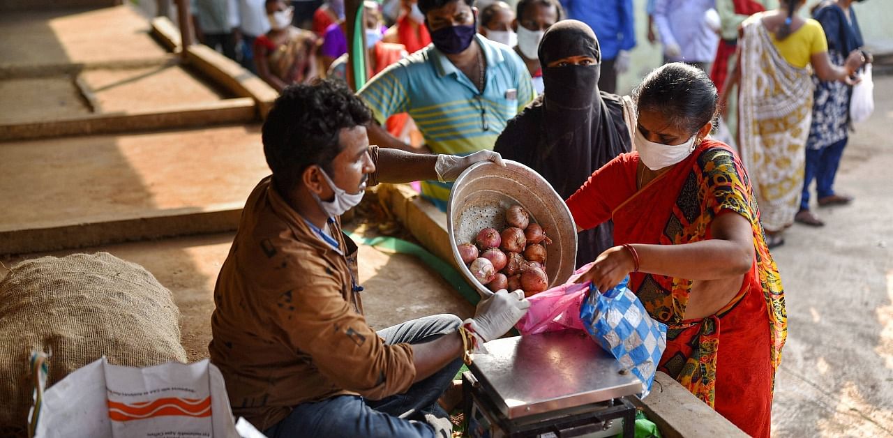 There has been a sudden spike in onion prices across cities in India reaching up to Rs 80-100 per kg. Credit: PTI