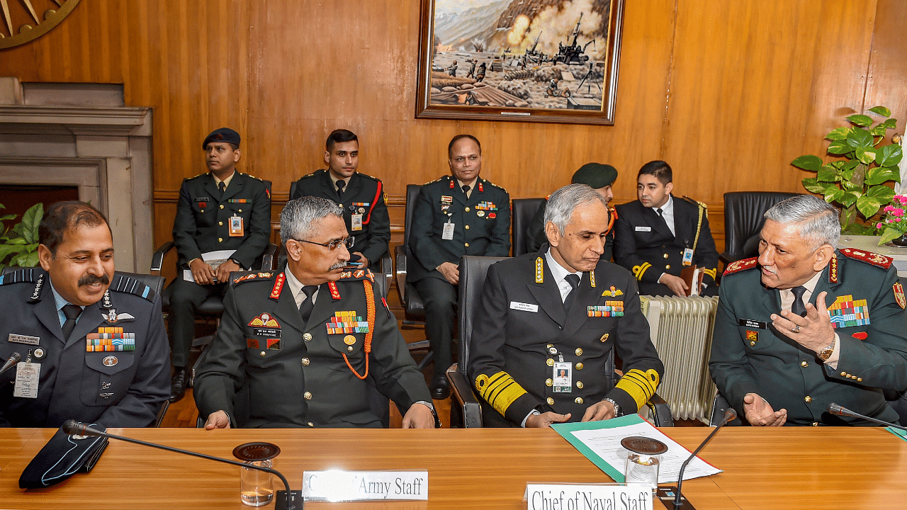 Chief of the Defence Staff Gen. Bipin Rawat, Navy Chief Admiral Karambir Singh and Army Chief Gen. Manoj Mukund Naravane and IAF chief Air Chief Marshal RKS Bhadauria. Credits: PTI Photo