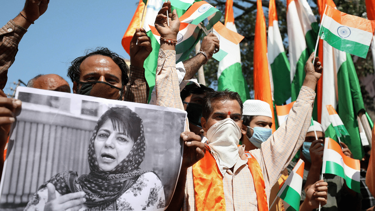 Activists during a protest against PDP President Mehbooba Mufti. Credits: PTI Photo