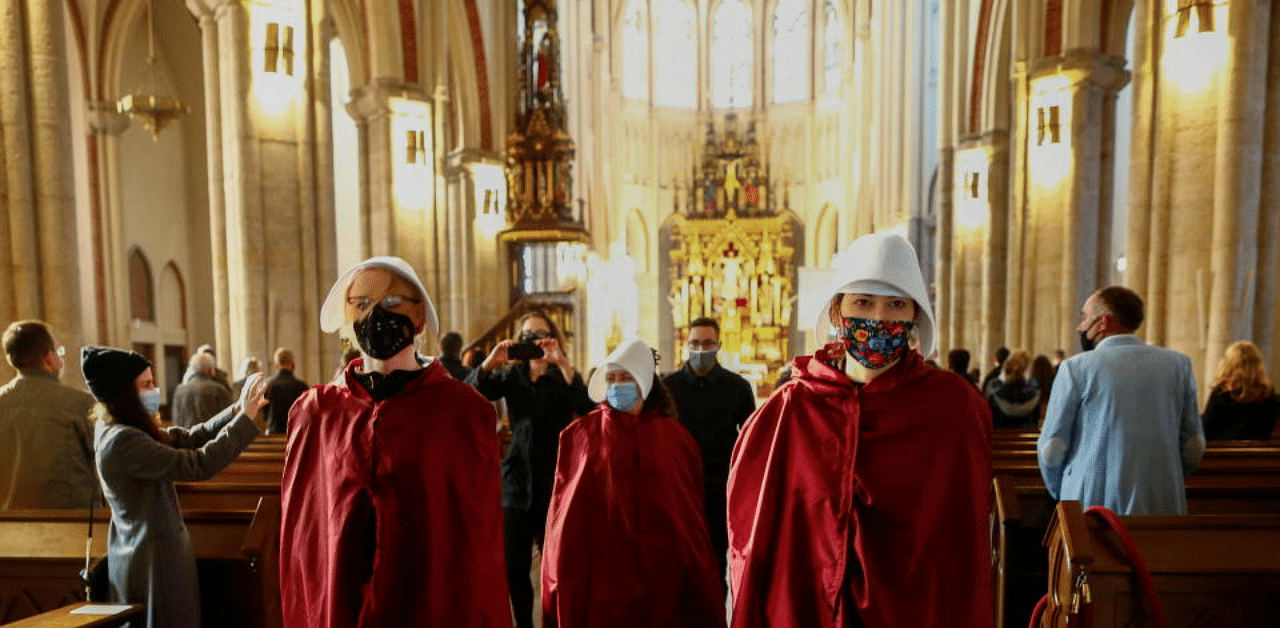 Demonstrators hold a protest against the ruling by Poland's Constitutional Tribunal that imposes a near-total ban on abortion, in a cathedral in Lodz, Poland October 25, 2020. Credit: Reuters Photo