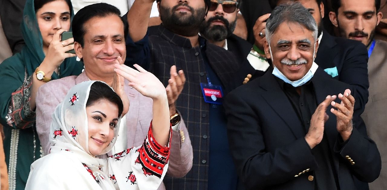 Maryam Nawaz (L), daughter of Pakistan's former prime minister Nawaz Sharif, and the leader of Pakistan Democratic Movement (PDM), waves to supporters during an anti-government rally in Quetta. Credit: AFP Photo