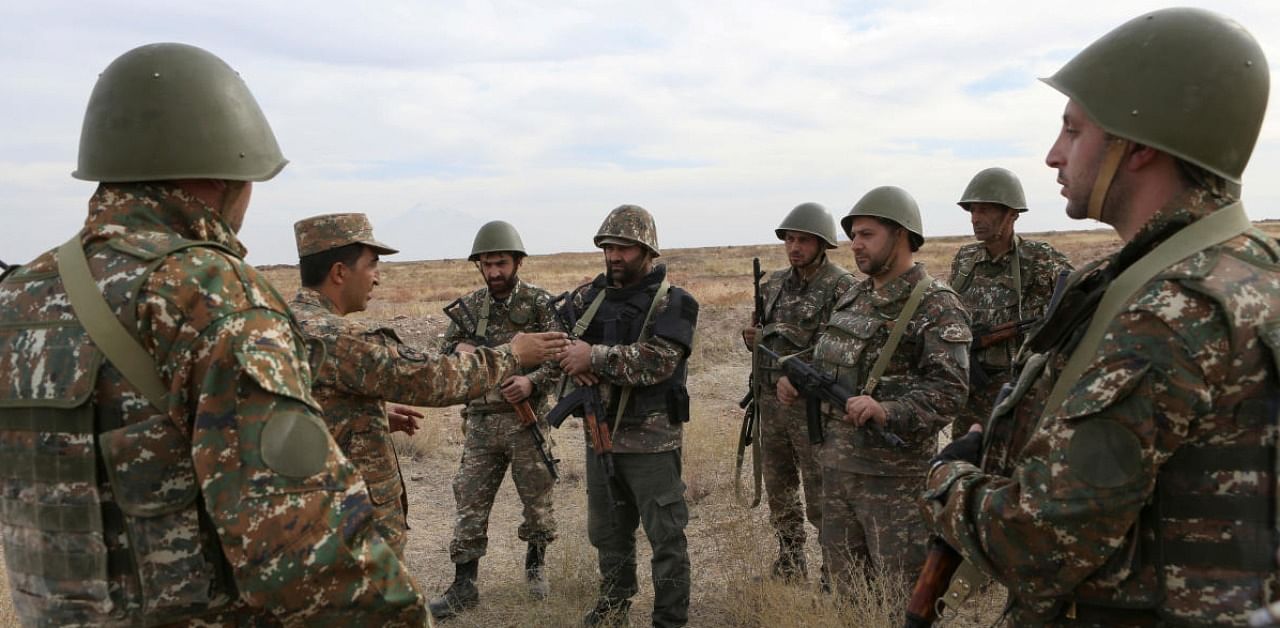 Armenian reservists undergo training at a firing range before their departure for the front line in the course of a military conflict with the armed forces of Azerbaijan. Credit: Reuters.