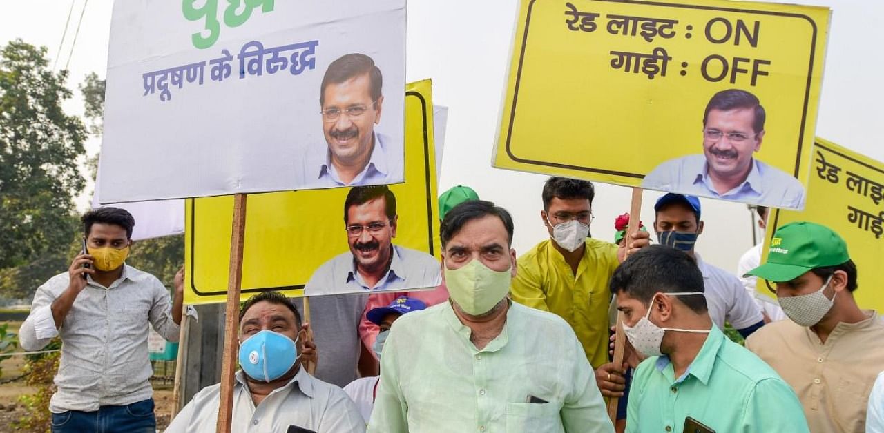 Delhi Environment Minister Gopal Rai participates in the 'Red Light On, Gaadi Off' campaign, launched by Delhi Government to tackle air pollution. Credit: PTI.