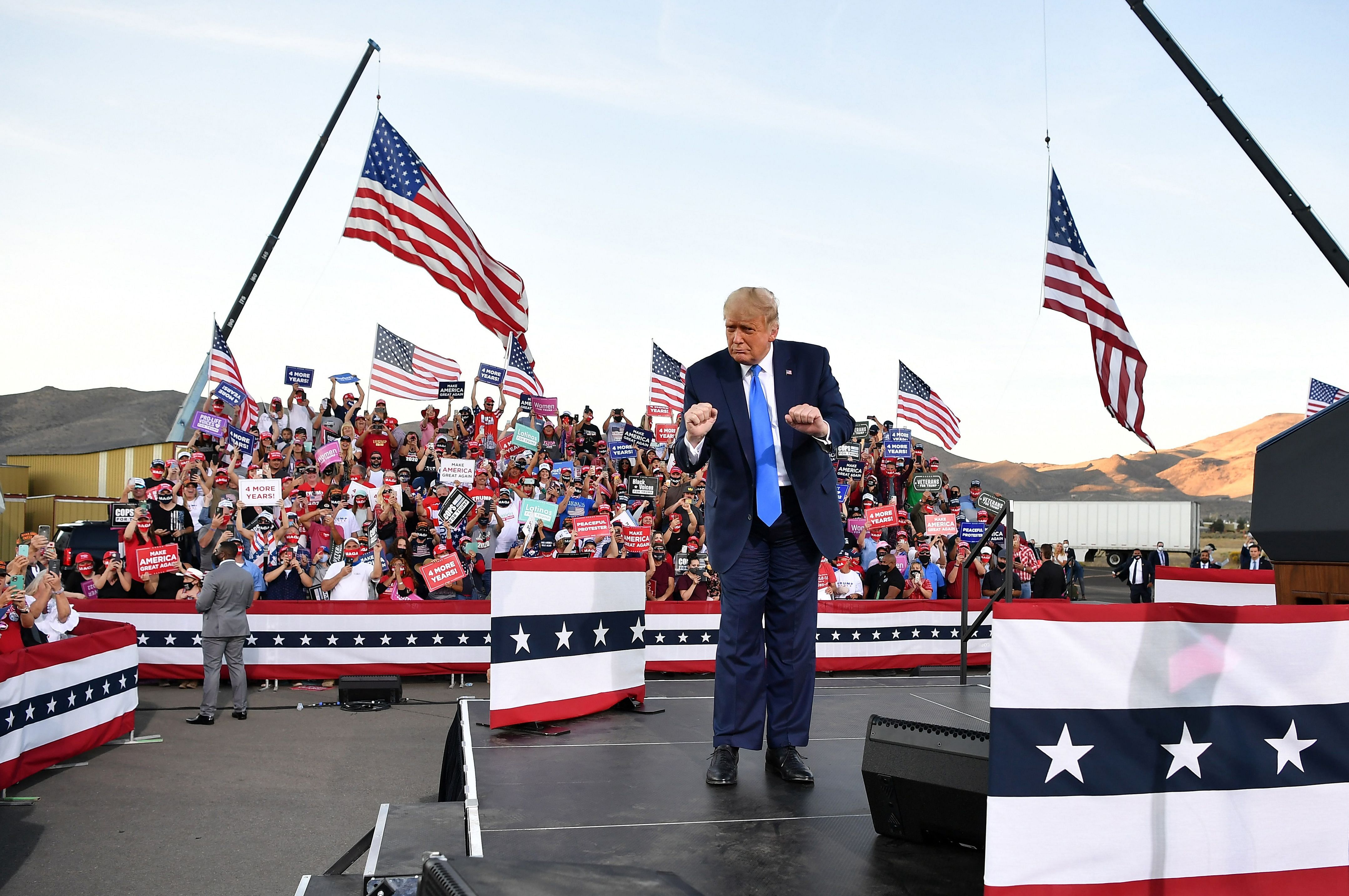 US President Donald Trump dances at the end of a rally at Carson City Airport in Carson City, Nevada. - US election day is quickly approaching, but this week has shown there's still plenty of time for dancing and video games on the campaign trail on October 18, 2020. Credit: AFP