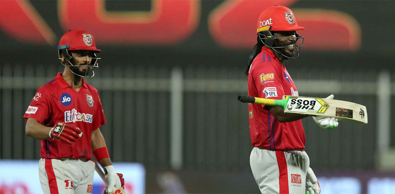 Mandeep Singh and Chris Gayle at Sharjah vs KKR. Credit: iplt20.com