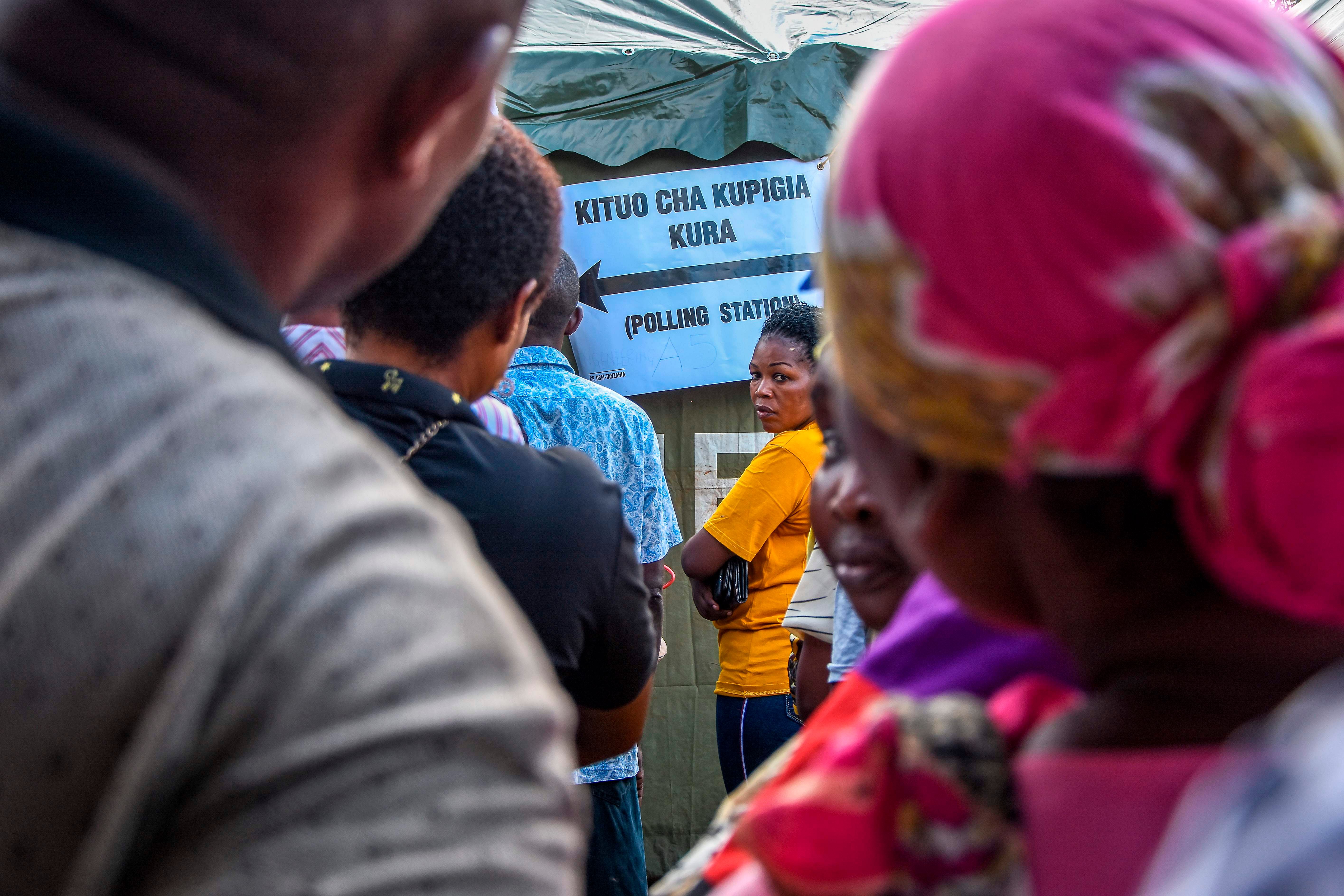 Voters form queues in the morning hours as they wait for the voting to open at Wazo Hill polling station in Dar es Salaam, Tanzania, on October 28, 2020. Credit: AFP Photo