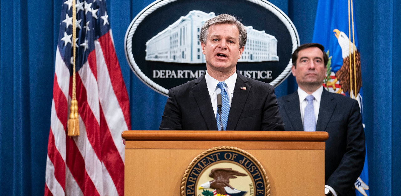  FBI Director Christopher Wray speaks during a virtual news conference at the Department of Justice, Wednesday, Oct. 28, 2020 in Washington, as Assistant Attorney General for National Security John Demers looks on. Credit: AP Photo