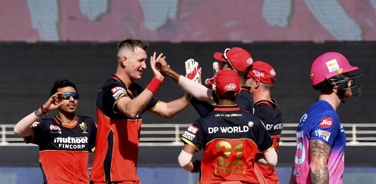 The addition of all-rounder Chris Morris (centre) has lent balance to the Royal Challengers Bangalore line-up in this IPL. Credit: Sportzpics