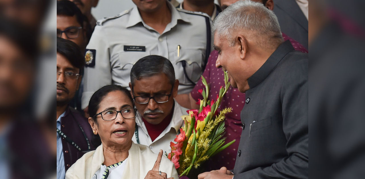 West Bengal Governor Jagdeep Dhankar (R) and Chief Minister Mamata Banerjee. Credit: PTI File Photo