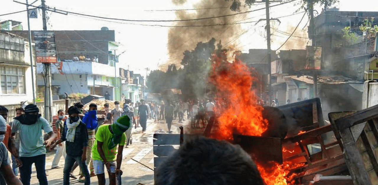 Protestors set on fire furniture after clashes with the police over immersion of Goddess Durga idols, in Munger, Thursday, Oct 29, 2020. Credit: PTI Photo