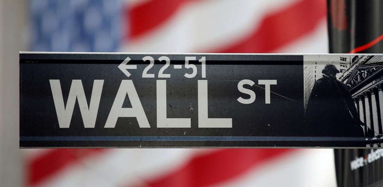 A sign for Wall Street across from the New York Stock Exchange. Credit: Reuters