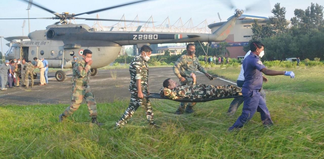 An injured jawan of Central Reserve Police Force (CRPF) being taken for treatment after an IED blast triggered allegedly by CPI-Maoist in Lohardaga district. Credit: PTI