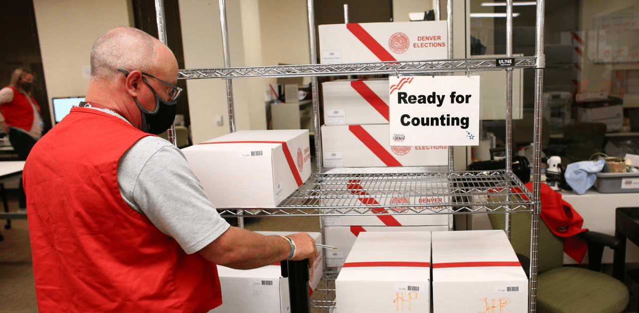 Mail-in ballots are processed and counted for the upcoming presidential election in Denver, Colorado, US. Credit: Reuters Photo