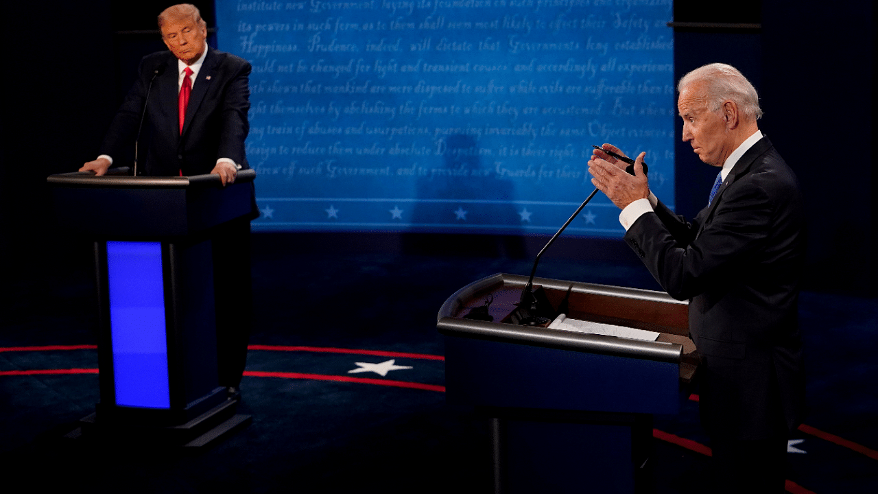 Former Vice President Joe Biden answers a question as President Donald Trump. Credits: Reuters Photo