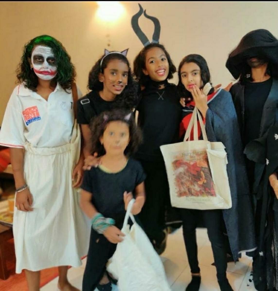 Zain (left) and her friends on Halloween last year.