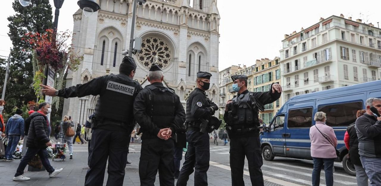 French gendarmes secure the area around the Notre-Dame de l'Assomption Basilica in Nice. Credit: AFP